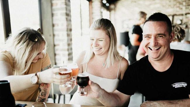 Lillian Bennet, Lucy Davis and Damon Strachan from Sneaky Baron enjoying beers on tour at Copperhead Restaurant Brewery. Picture: Graeme Passmore Photography