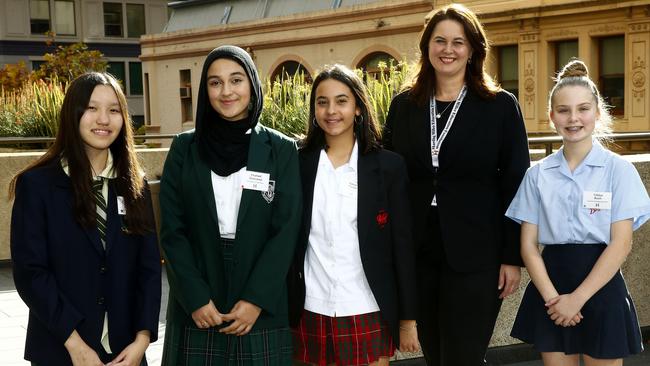 HMEF executive director Cara Varian with 2019 scholarship recipients and Year 9 students Yen Hoang, Chahed Dennaoui, Sabah Swade and Tahlya Bush. Picture: John Appleyard