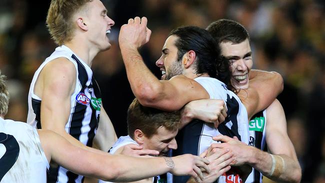 Collingwood players celebrate against the Tigers. Picture: Mark Stewart