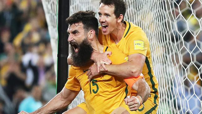 Mile Jedinak celebrates one of his three goals against Honduras. Picture: Getty Images