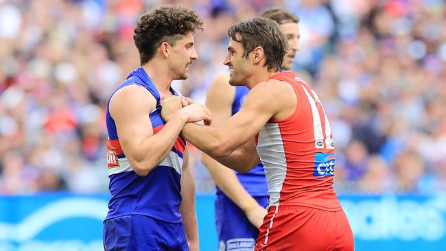 Tom Liberatore and Josh Kennedy go toe-to-toe. Picture: Alex Coppel