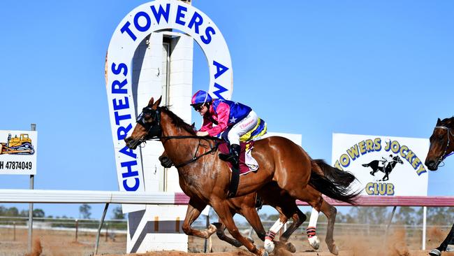 Years gone past: Charters Towers Amateurs Races 2020. TITLEY'S DEPARTMENT STORE BENCHMARK 55 HANDICAP 1200M - We'll Beat It crosses third. Picture: Alix Sweeney