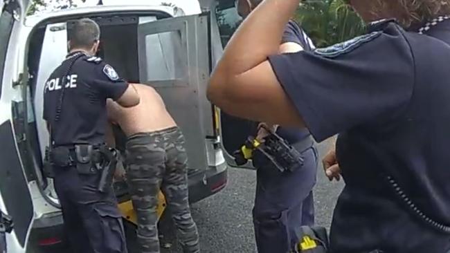 Cairns Child Protection and Investigation Unit (CPIU) detectives arrest a man during Operation Uniform Kalahari. Picture: Queensland Police