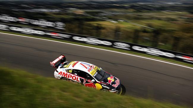 Whincup charges down the Esses at the top of Mount Panorama. Picture: Tim Hunter