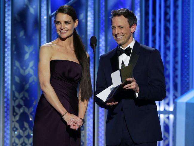 Katie Holmes and Seth Meyers present an award at the 72nd Annual Golden Globe Awards.