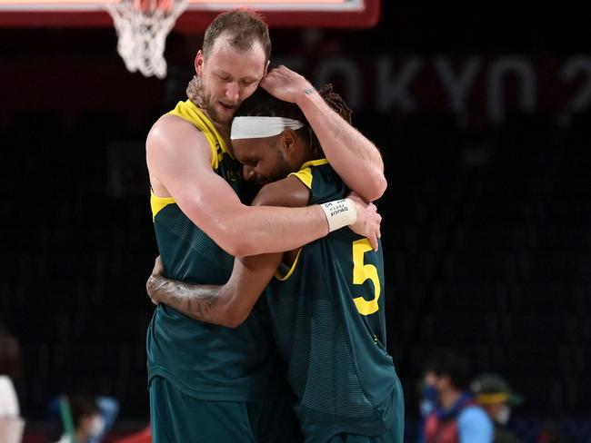 The iconic image of Joe Ingles and Patty Mills embracing after the Tokyo Olympic bronze medal was safely in their keeping. Picture: AFP