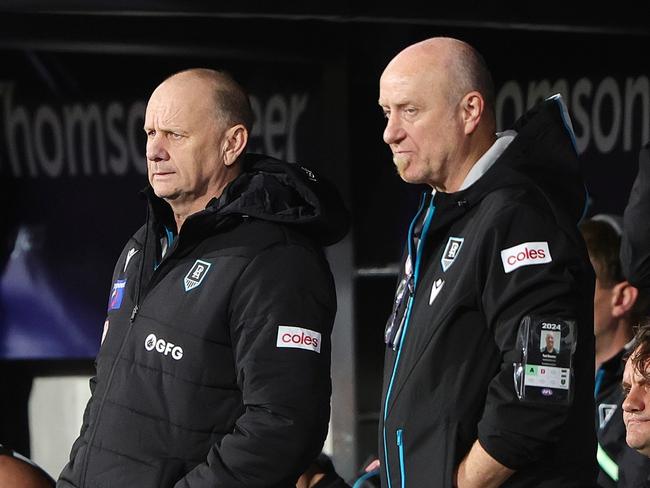 ADELAIDE, AUSTRALIA - MAY 02: Ken Hinkley, Senior Coach of the Power coaching from the bench during the 2024 AFL Round 08 match between the Adelaide Crows and the Port Adelaide Power at Adelaide Oval on May 02, 2024 in Adelaide, Australia. (Photo by Sarah Reed/AFL Photos via Getty Images)