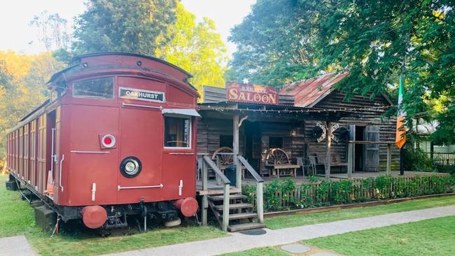 This Luxury Train &amp; Irish Pub accommodation includes a converted train that sleeps 18, billiards tables and a private non-licensed BYO Irish pub. Picture: Airbnb