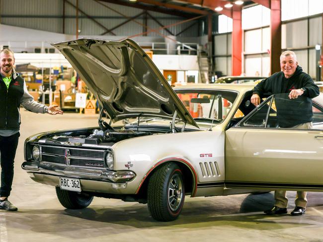 News ADV  Auction house Grays Online is selling a Holden HK Monaro - and has a price tag of $250,000 on it. Pic of Auction Manager of Motor vehicles Bobby Tuff (blue wind-cheater) and Jarrad Hannaford with the Monaro