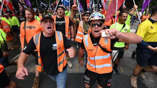 Angry CFMEU members march through Brisbane protesting about alleged wage theft, sham contracting and insolvency. Picture: Lyndon Mechielsen