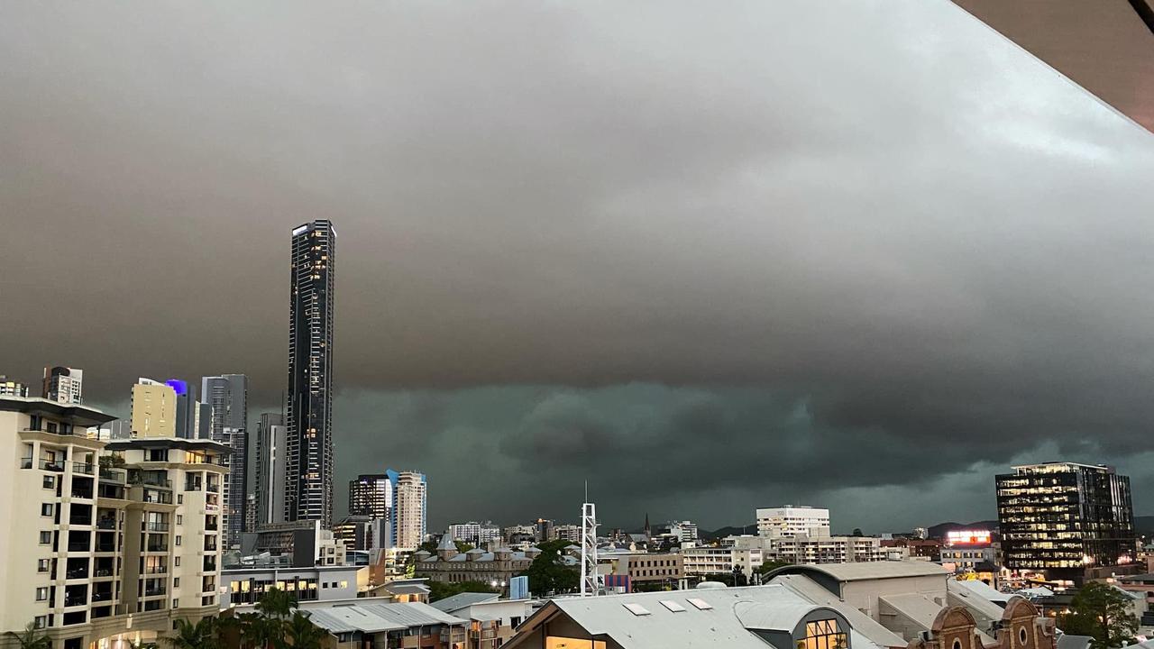 Green clouds loom over Brisbane as the storm approaches.