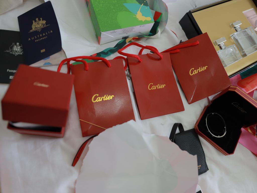 Woman charged over 50k Cartier Sydney Airport heist Daily Telegraph