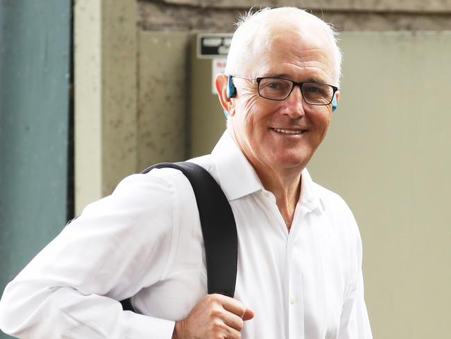 Ex PM Malcolm Turnbull leaves home on foot to catch the Victor Chang ferry from Rose Bay .picture John Grainger