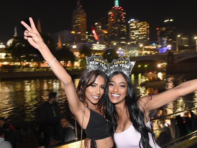 People celebrating into the New Year 2020 in Melbourne. (L-R) Yasumi Maneka and Nikita Nadan. Picture: Tony Gough