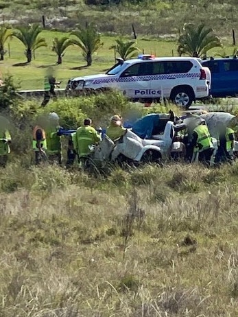 A woman from Harristown has been left with critical injuries following a crash on the Warrego Highway near Plainlands. Picture: RACQ LifeFlight Rescue