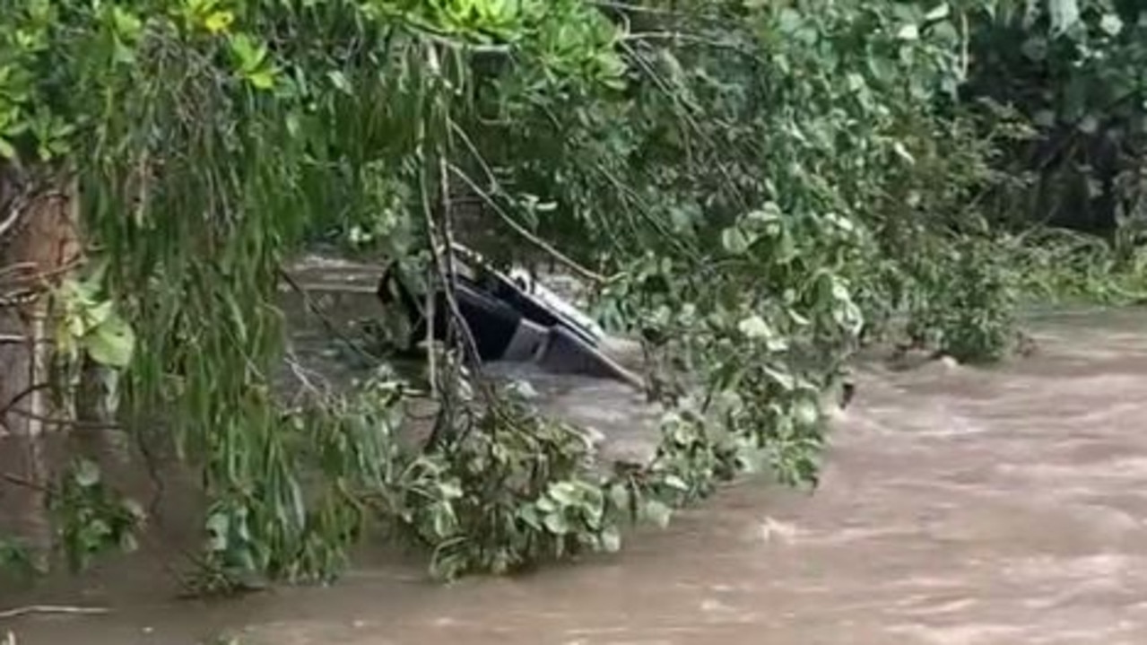 A woman has died after her car was swept away north of Mackay this morning. Picture: 9 News