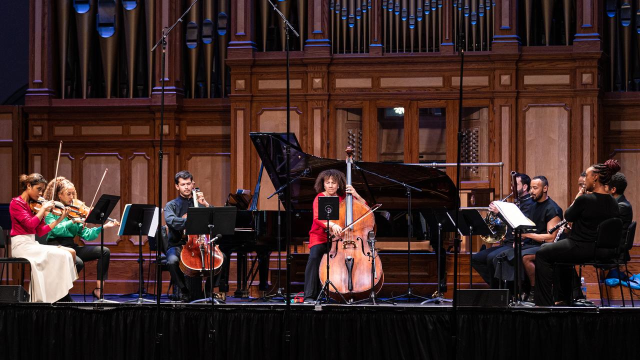 Chineke! Chamber Ensemble performs at Adelaide Town Hall with founder Chi-chi Nwanoku, centre, on double bass. Picture: Andrew Beveridge, supplied