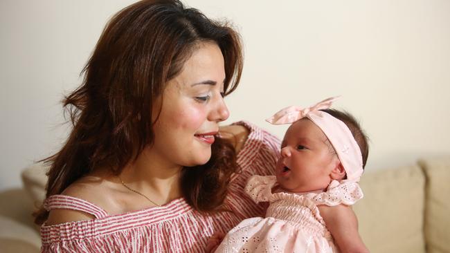 Mum Nevein Danial cuddles her third child Eliana, who was born at home after a speedy three hour labour. Picture: Robert Pozo