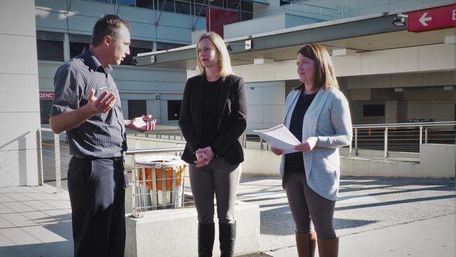 Launceston General Hospital registered nurse and ANMF representative Tom Millen speaks with Opposition leader Rebecca White and Labor health spokeswoman Sarah Lovell. Picture: CHRISTOPHER TESTA.