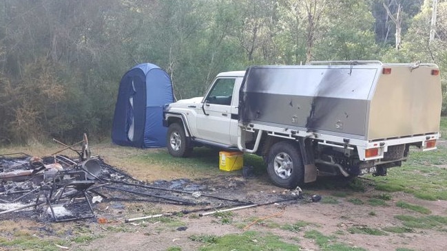 Russell Hill and Carol Clay’s burnt-out campsite near Dry River track at Billabong in the Wonnangatta Valley. Picture: ABC