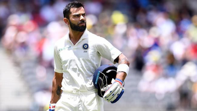 India captain Virat Kohli leaves the field after being dismissed for 123 on day three of the second Test in Perth. Picture: AAP