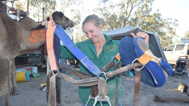 Kyrraley Woodhouse from Woodhouse Camels in Boulia demonstrating just how little saddle there is when it comes to camel racing. Picture: Kate McCormack