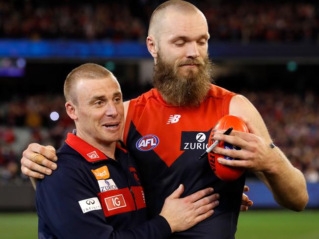 Max Gawn of the Demons celebrates with coach Simon Goodwin.