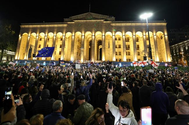 Georgian opposition supporters rally in Tbilisi against the results of parliamentary elections that the opposition says were rigged