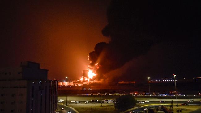 Smoke and flames rise from a Saudi Aramco oil facility in Saudi Arabia's Red Sea coastal city of Jeddah, on March 25, 2022, following a reported Yemeni rebels attack.