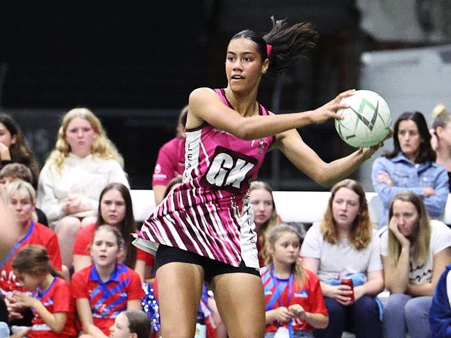 Leps' Ciarn MacBride catches the ball mid air in the Cairns Netball Division 1 grand final match between the WGC Sharks and the Cairns Leprechauns. Picture: Brendan Radke