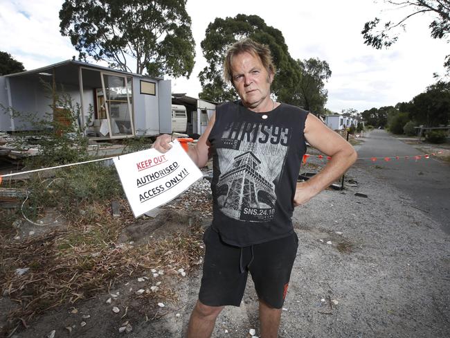 David Filliponi, 57, surrounded by what is left of his neighbours’ homes. Picture: David Caird