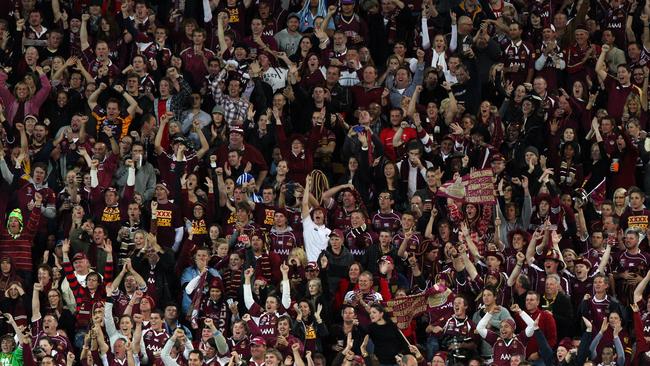 Queensland fans celebrating a State of Origin win at Suncorp Stadium. Picture: AAP