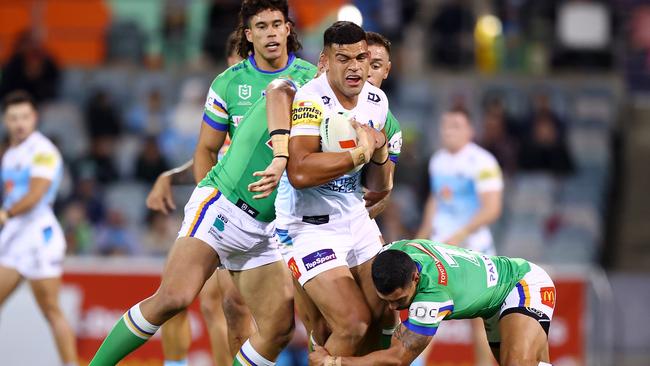 David Fifita of the Titans is tackled during the round six NRL match between Canberra Raiders and Gold Coast Titans. (Photo by Mark Nolan/Getty Images)