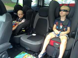 Children should remain in booster seats until they're at least 145 centimetres. Picture: Iain Curry