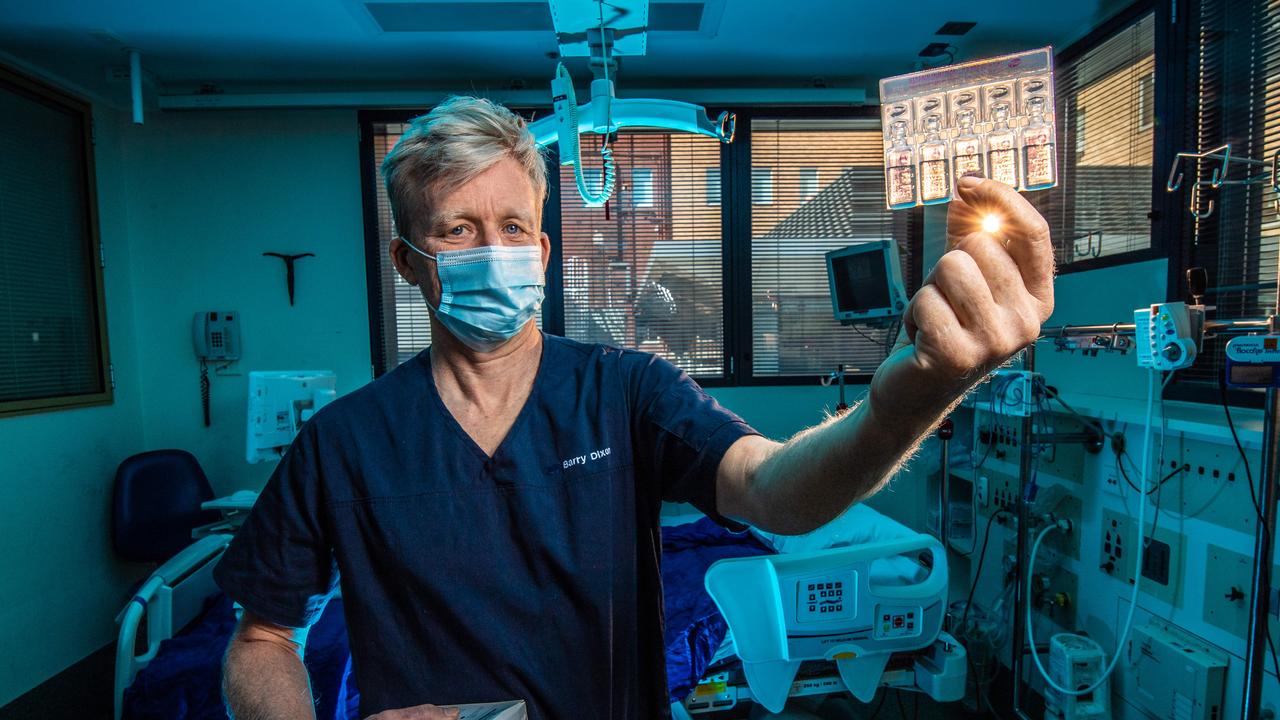 Dr Barry Dixon at St Vincents Hospital in Melbourne with the heparin nasal spray it is hoped will work against Covid-19. Picture: Jason Edwards