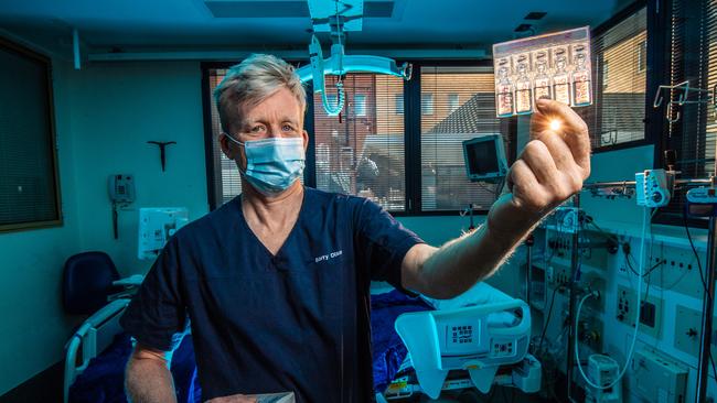 Dr Barry Dixon at St Vincents Hospital in Melbourne with the heparin nasal spray it is hoped will work against Covid-19. Picture: Jason Edwards