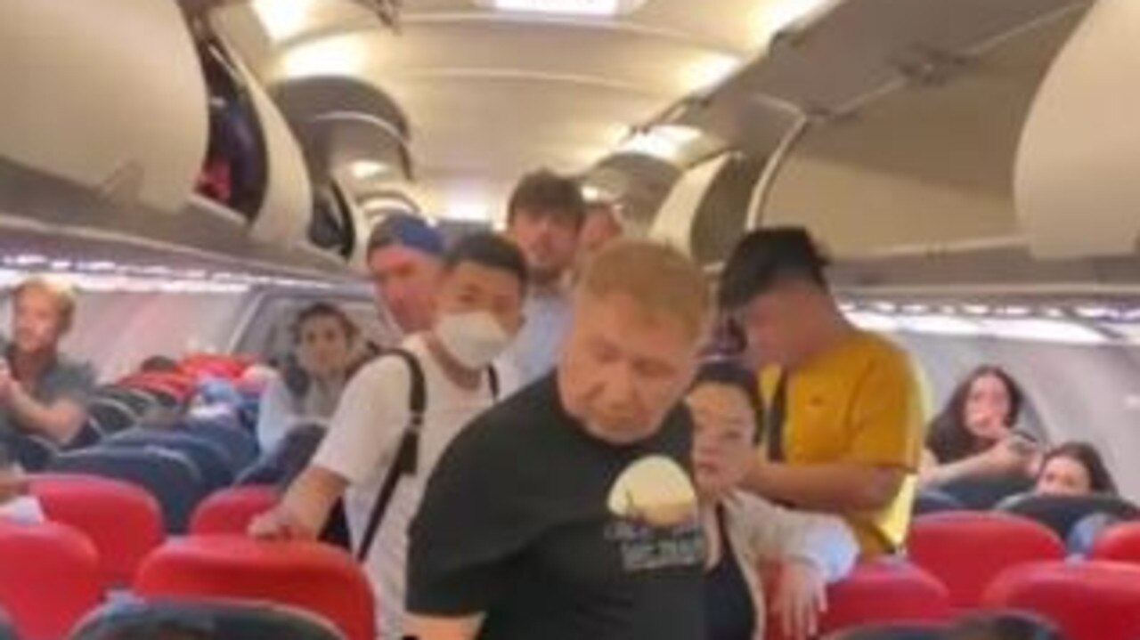 The skin-crawling midair discovery of the cold-blooded stowaway rattled the passengers. Picture: Supplied