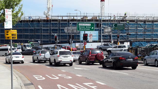 The business owners are angry after being told a "peak hour" bus lane outside their shops on Old Northern Rd will be changed to 24 hour bus lane, and they will lose parking for their customers. Picture: AAP Image/David Swift