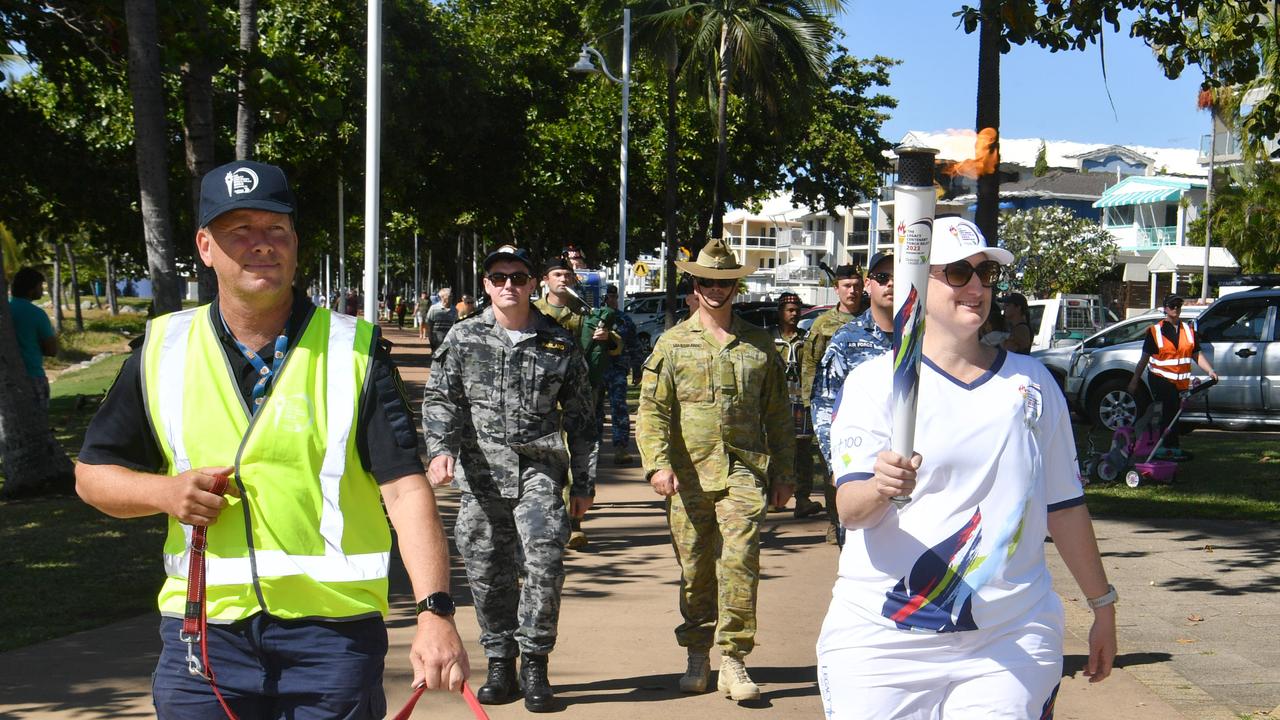 Legacy Centenary Torch Relay and community day at Jezzine Barracks. Rural fire fighter Les Packer with Ike and Torch bearer Wing Commander Naomi Gill. Picture: Evan Morgan Picture: Evan Morgan