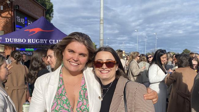 Two women celebrating at Dubbo Kangaroos Rugby Club Ladies Day. Photo: Tijana Birdjan