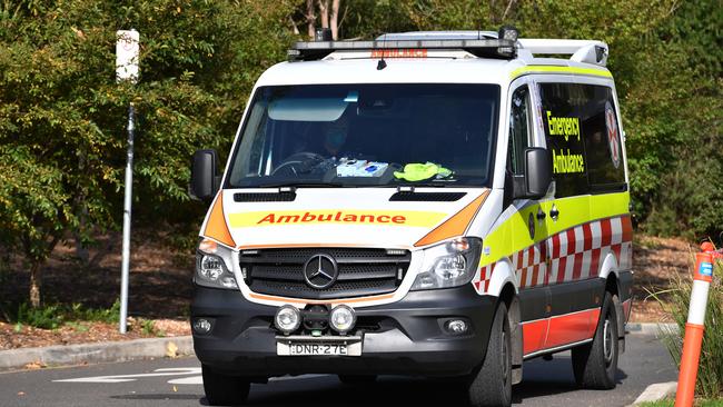 An ambulance leaves Newmarch House in May. Picture: AAP Image/Dean Lewis