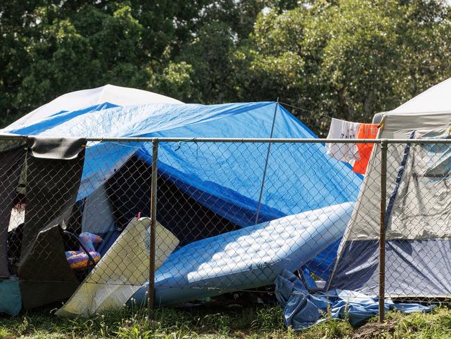 Tents in a fenced off area at Musgrave Park in South Brisbane which has seen an escalation of fighting and unsociable behaviour according to council complaints.