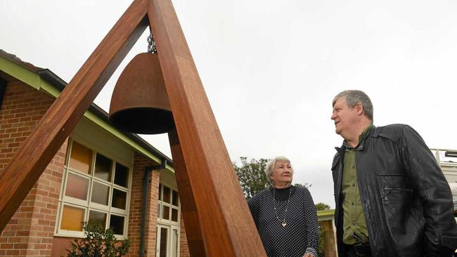 Church Warden of St Pauls, Helen Brown  and Reverend John Power examine the fake bell installed at the church by thieves. Picture: Marc Stapelberg