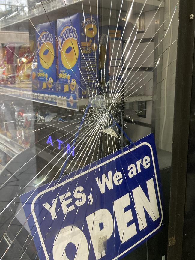 The owner of this King William St store says he won't replace his doors broken by thieves any more because of the cost. Picture: Mile Kemp