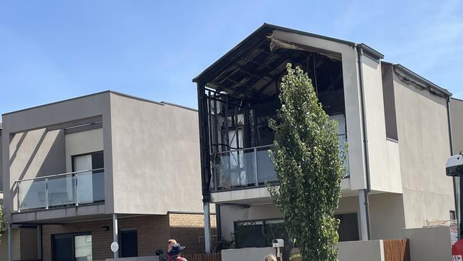 A townhouse caught fire on Friday about 2pm on Queens Circuit in Sunshine. Picture: Athos Sirianos.