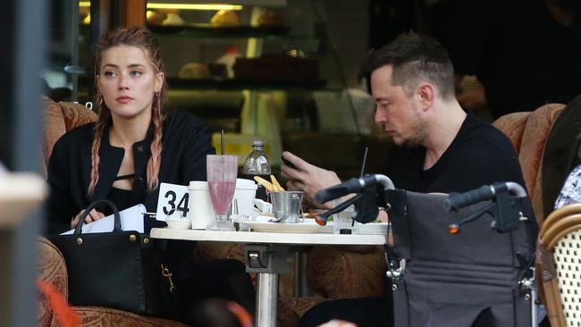 Amber Heard and Elon Musk eat at the Shingle in Broadbeach. Picture: Nigel Hallett