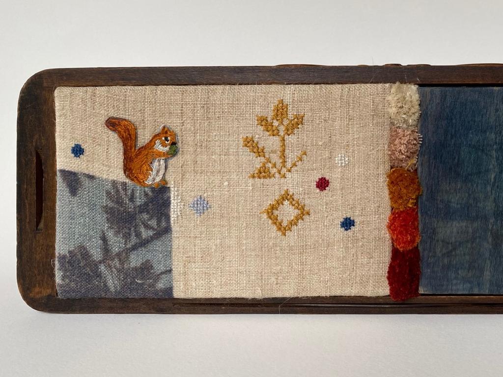 Oksana Waterfall, Border Art Prize 2020 $3000 winner, The girl from Kyiv 2020, oil, embroidery thread, vintage hemp fabric and solar print in vintage sewing machine drawer, 12 x 36cm. Picture: SUPPLIED