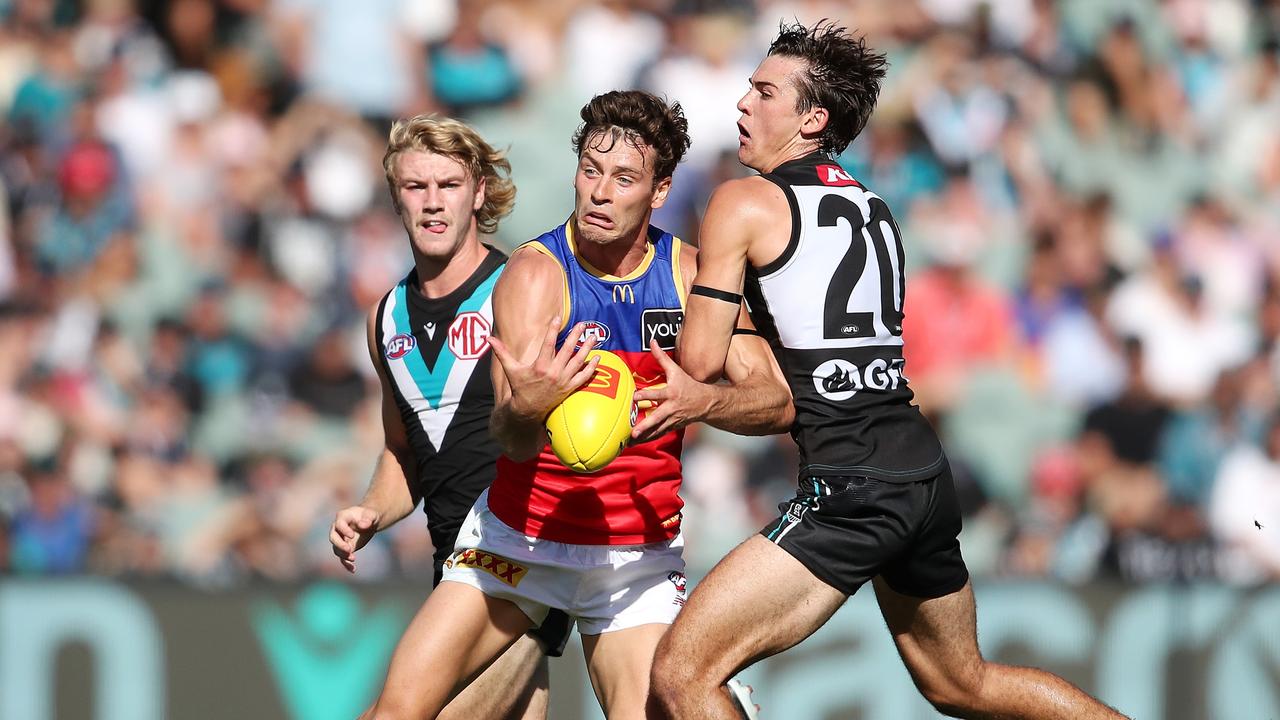 Brisbane’s midfield, which added Josh Dunkley (centre) over the off-season, was beaten up by a young Port Adelaide onball brigade in Round 1. Picture: Getty Images