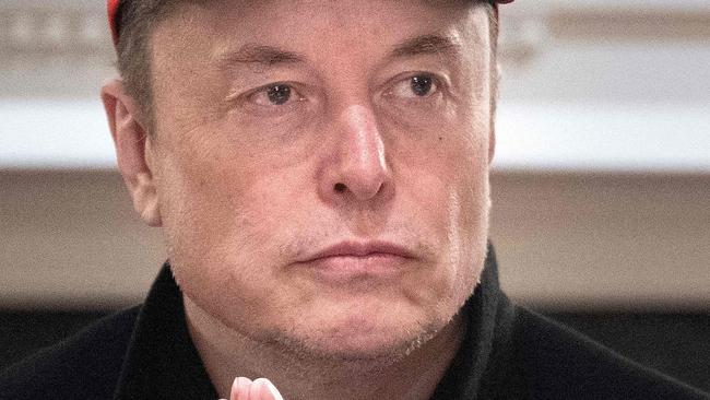 (FILES) Elon Musk looks on during a Cabinet Meeting in the Cabinet Room of the White House March 24, 2025 in Washington, DC. During his time as US President Donald Trump's controversial cost-cutting billionaire adviser, Elon Musk grabbed nearly as much media attention as the US president. The South African-born 53-year-old's official title is the non-descript 