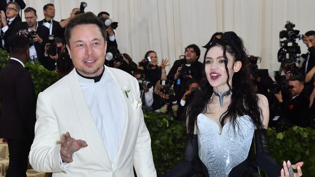 Musk with his partner, the musician Grimes. The couple has a son, X Æ A-12. Picture: AFP